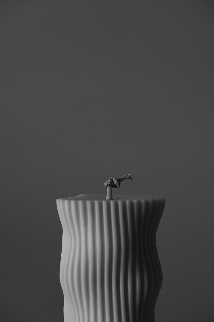 ribbed wave pillar candle in black and white